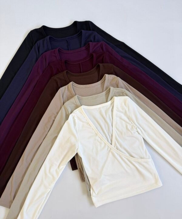 1190/3-REMERA MORLEY TAO MANGA LARGA CRUCE DELANTERO DOBLE